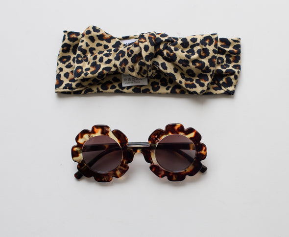 Leopard headwrap and sunglasses